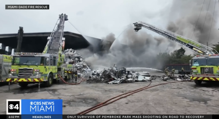 Thick black smoke rising from scrap metal fire at Miami-Dade recycling facility, April 2025