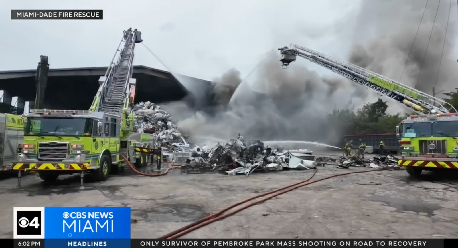 Thick black smoke rising from scrap metal fire at Miami-Dade recycling facility, April 2025