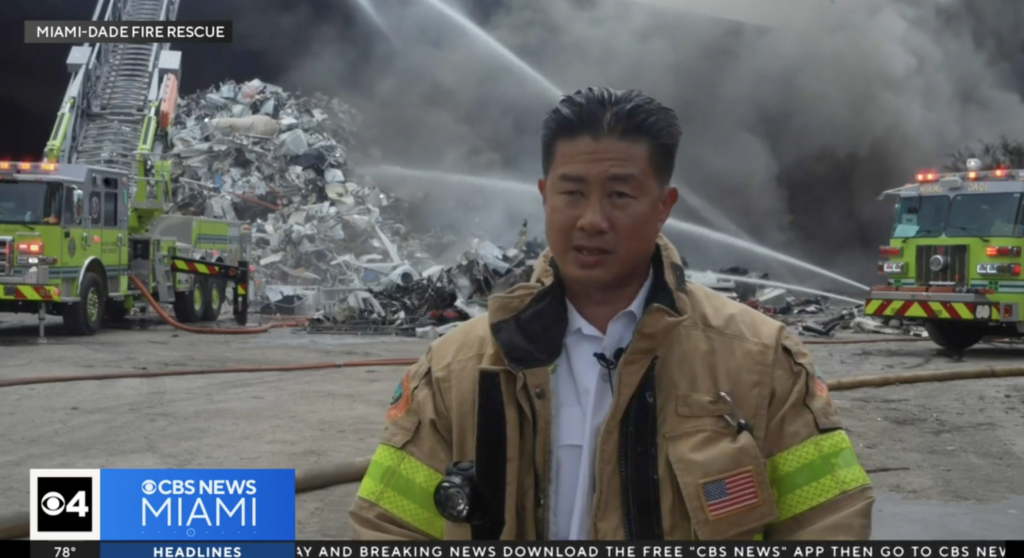 Thick black smoke rising from scrap metal fire at Miami-Dade recycling facility, April 2025